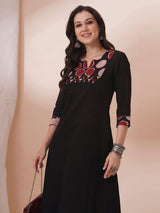 Princess line kurta in black cotton slub paired with hand block and hand embroidery.