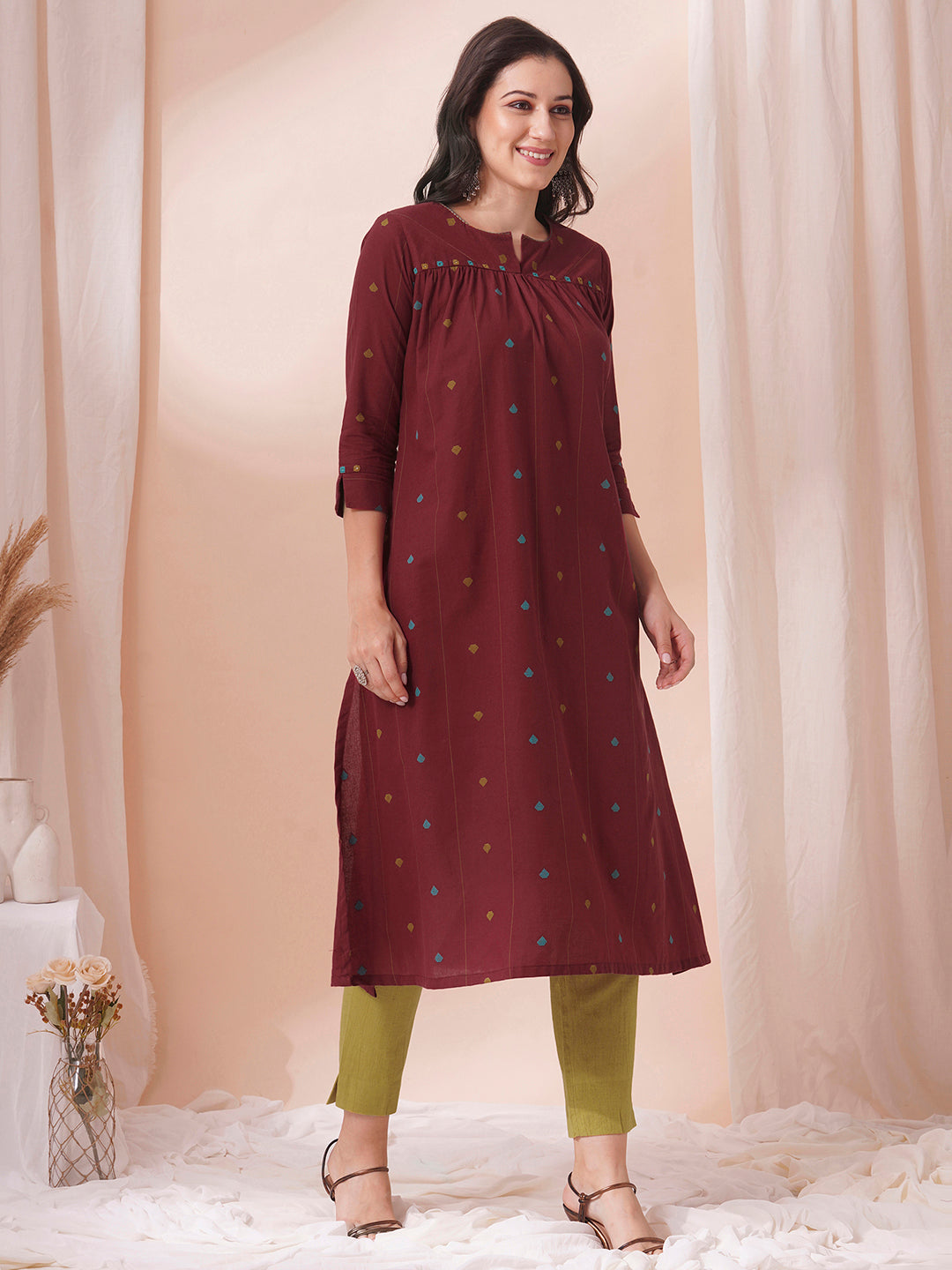Pocketed cotton dobby kurta with gathering and mirror work.