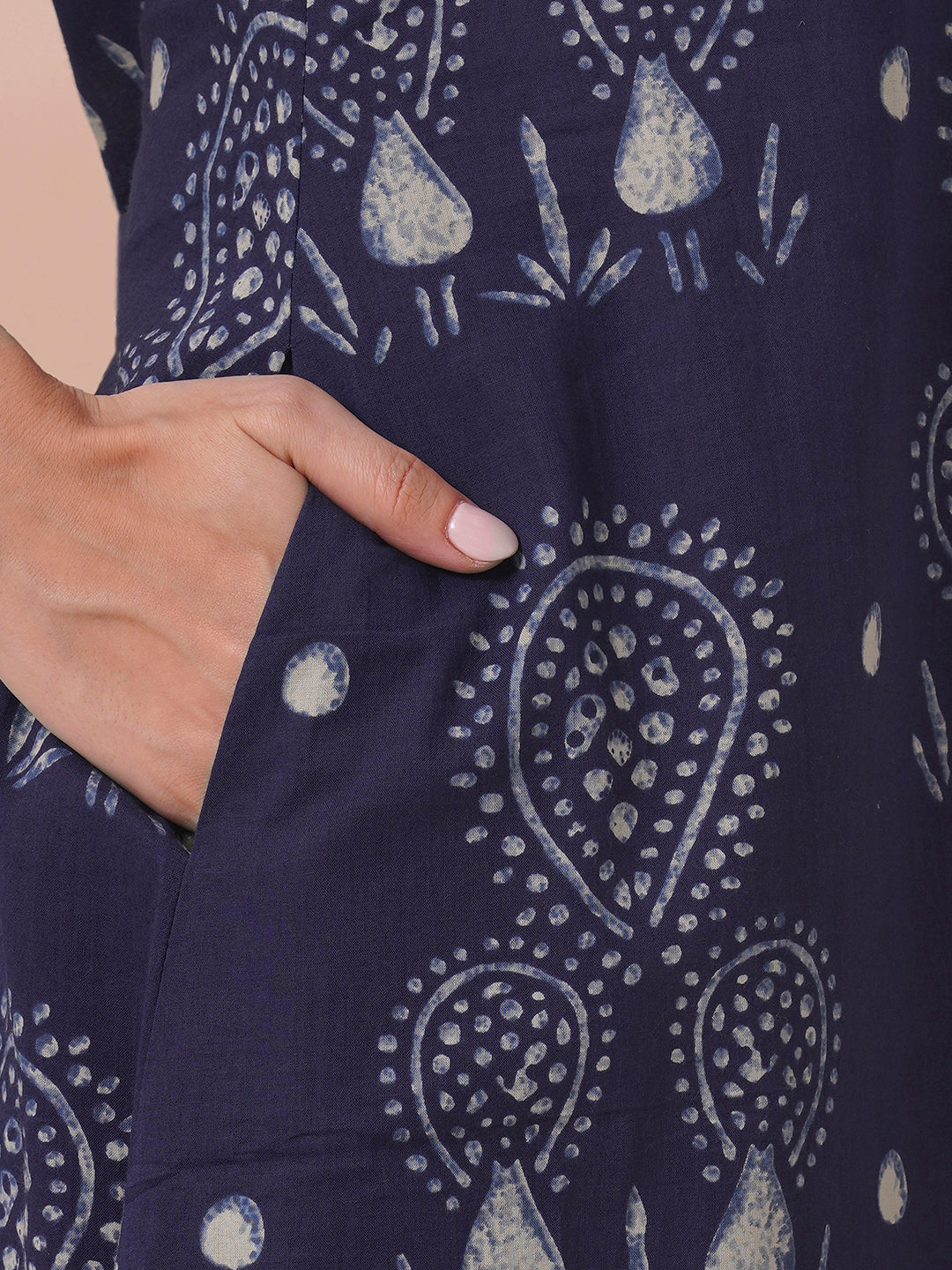 A-line kurta in printed cotton with gathered stripe print on the neckline with handwork.