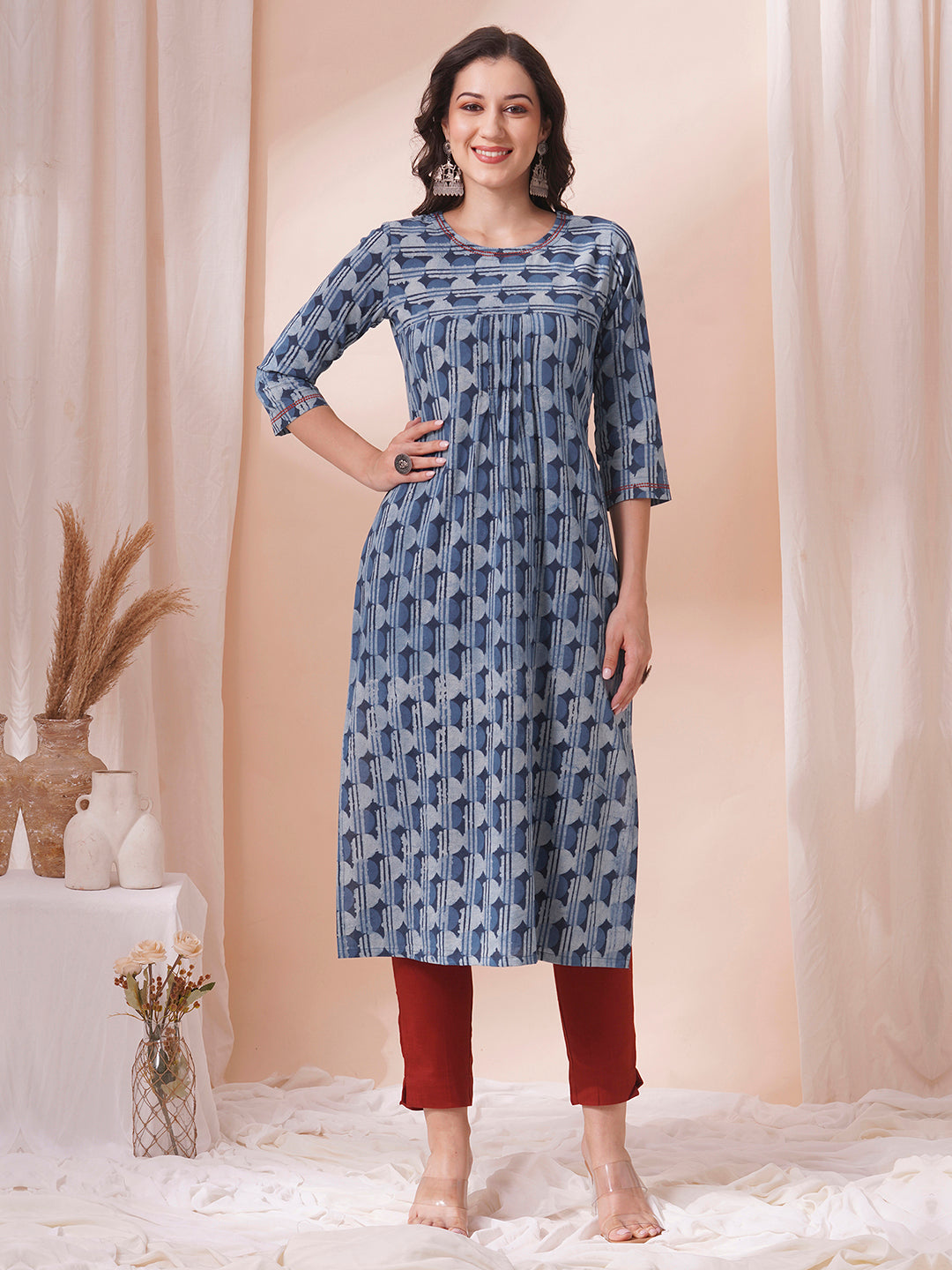 Straight fit dhabu print kurta with embroidery and pleating.