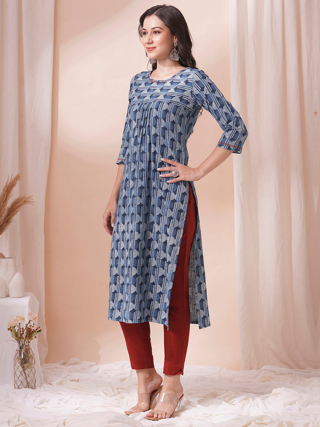 Straight fit dhabu print kurta with embroidery and pleating.