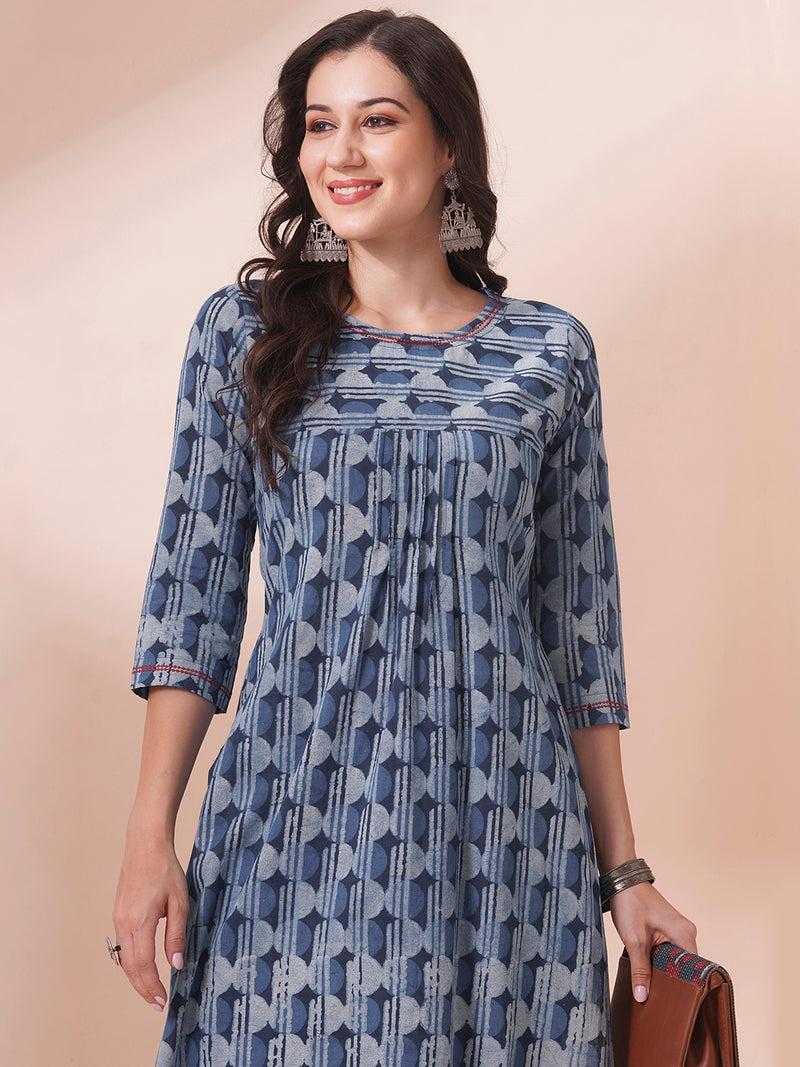 Straight fit dhabu print kurta with embroidery and pleating.