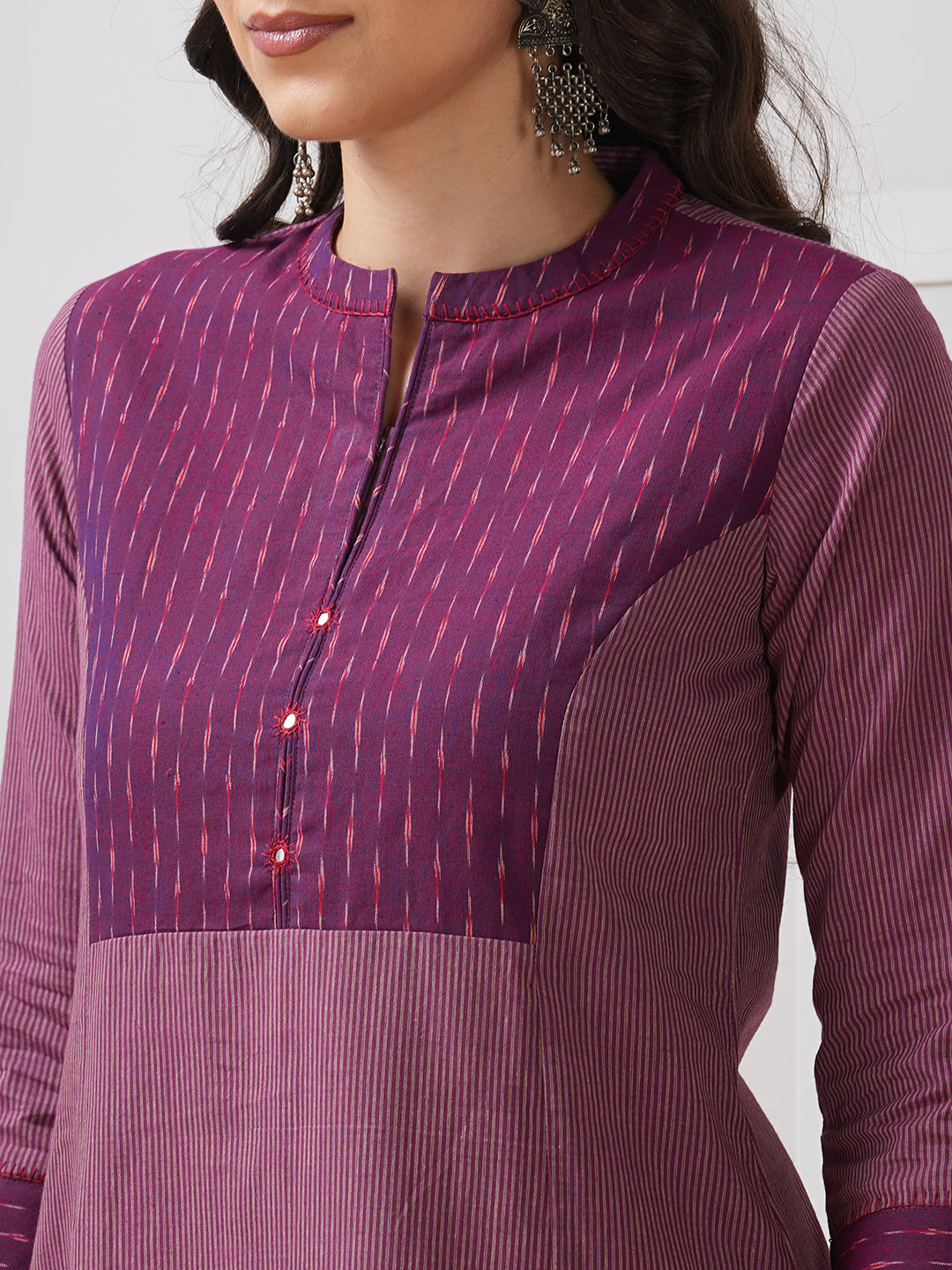 Striped cotton kurta in an A line fit with an ikkat trim and hand embroidery.