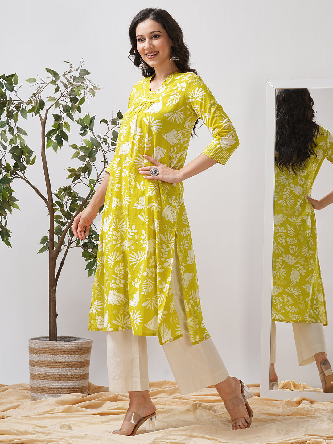 Gathered A line kurta in printed cotton fabric with hand embroidery and pocket.