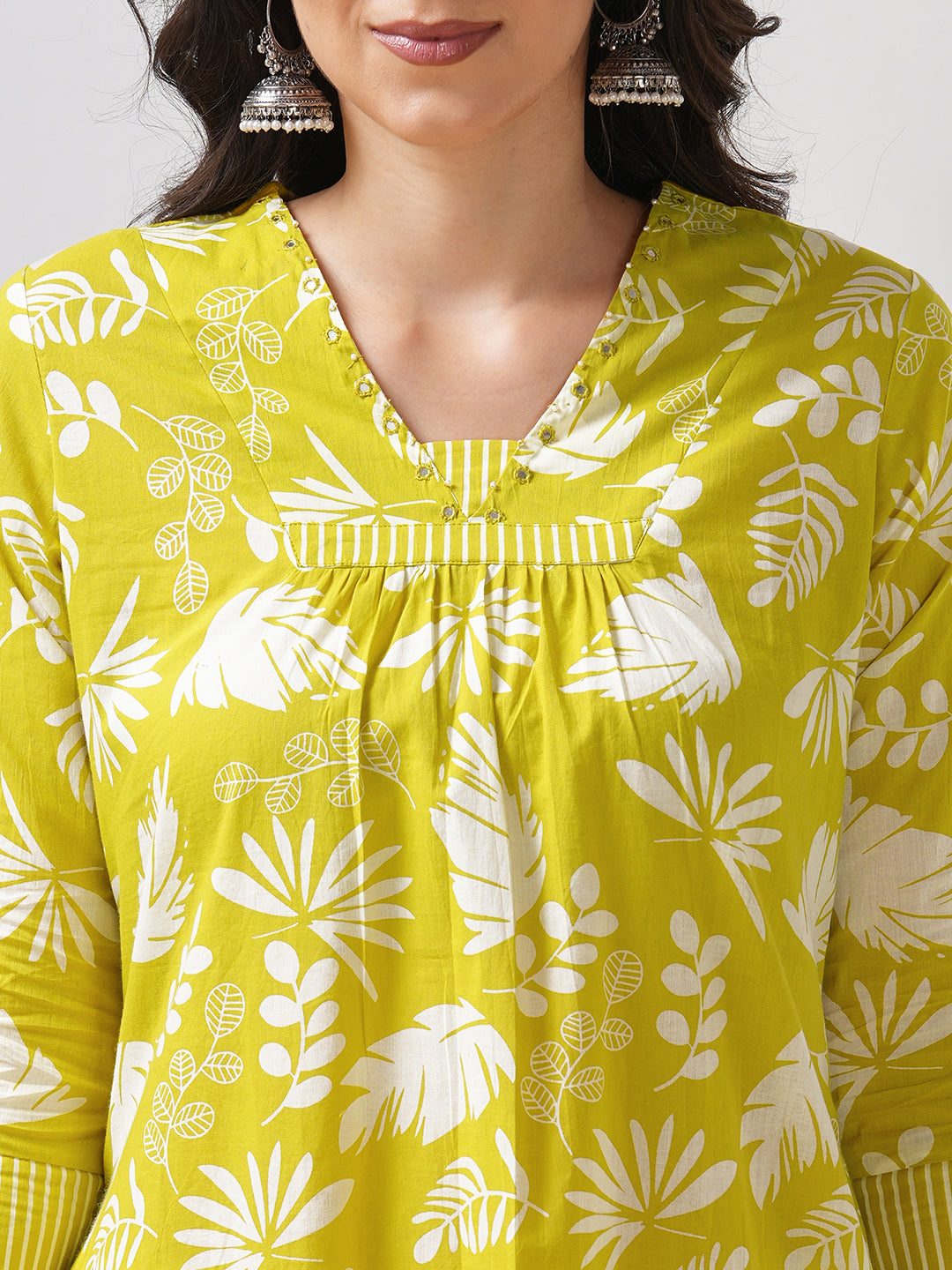 Gathered A line kurta in printed cotton fabric with hand embroidery and pocket.