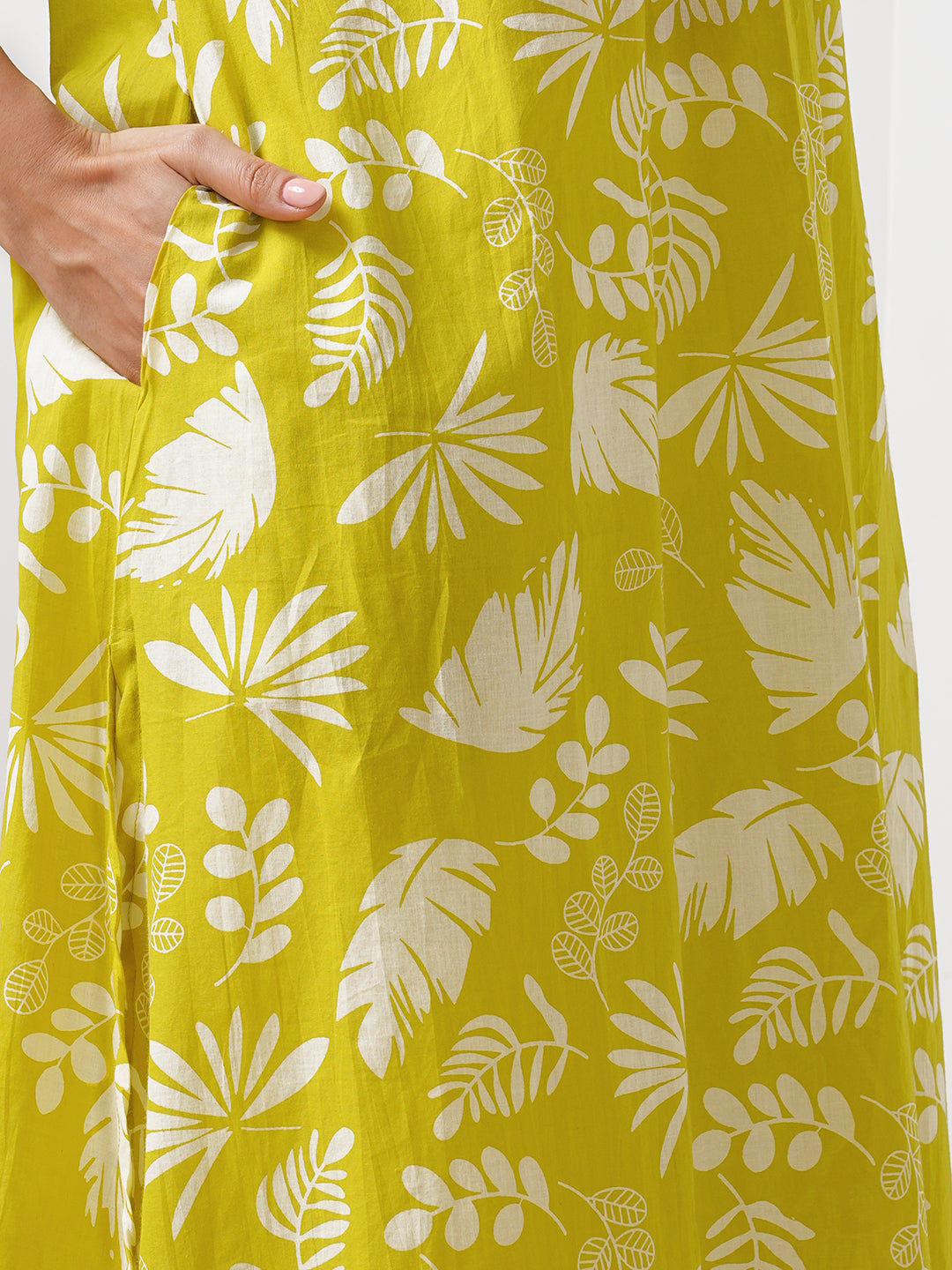 Gathered A line kurta in printed cotton fabric with hand embroidery and pocket.