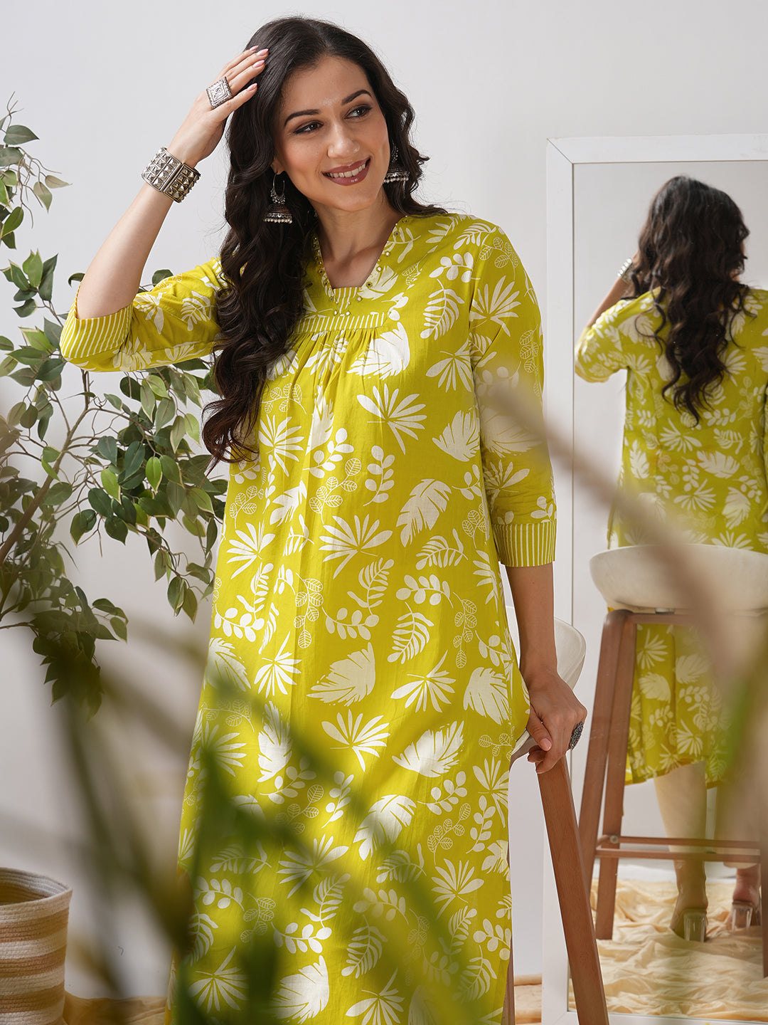 Gathered A line kurta in printed cotton fabric with hand embroidery and pocket.