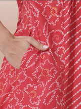 Red Pleated cotton print kurta in an A-Line fit with hand embroidery and pocket.