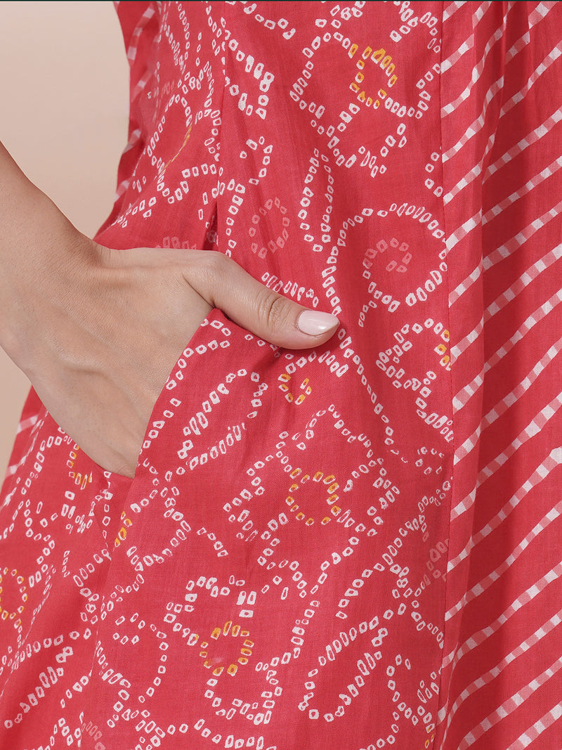 Red Pleated cotton print kurta in an A-Line fit with hand embroidery and pocket.