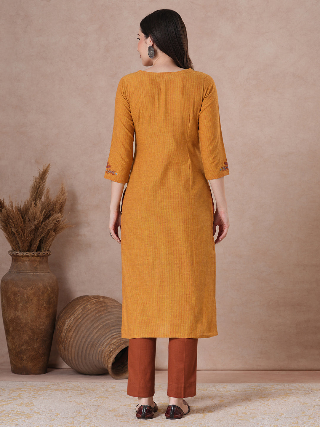 Embroidered straight fit kurta in checkered cotton fabric.