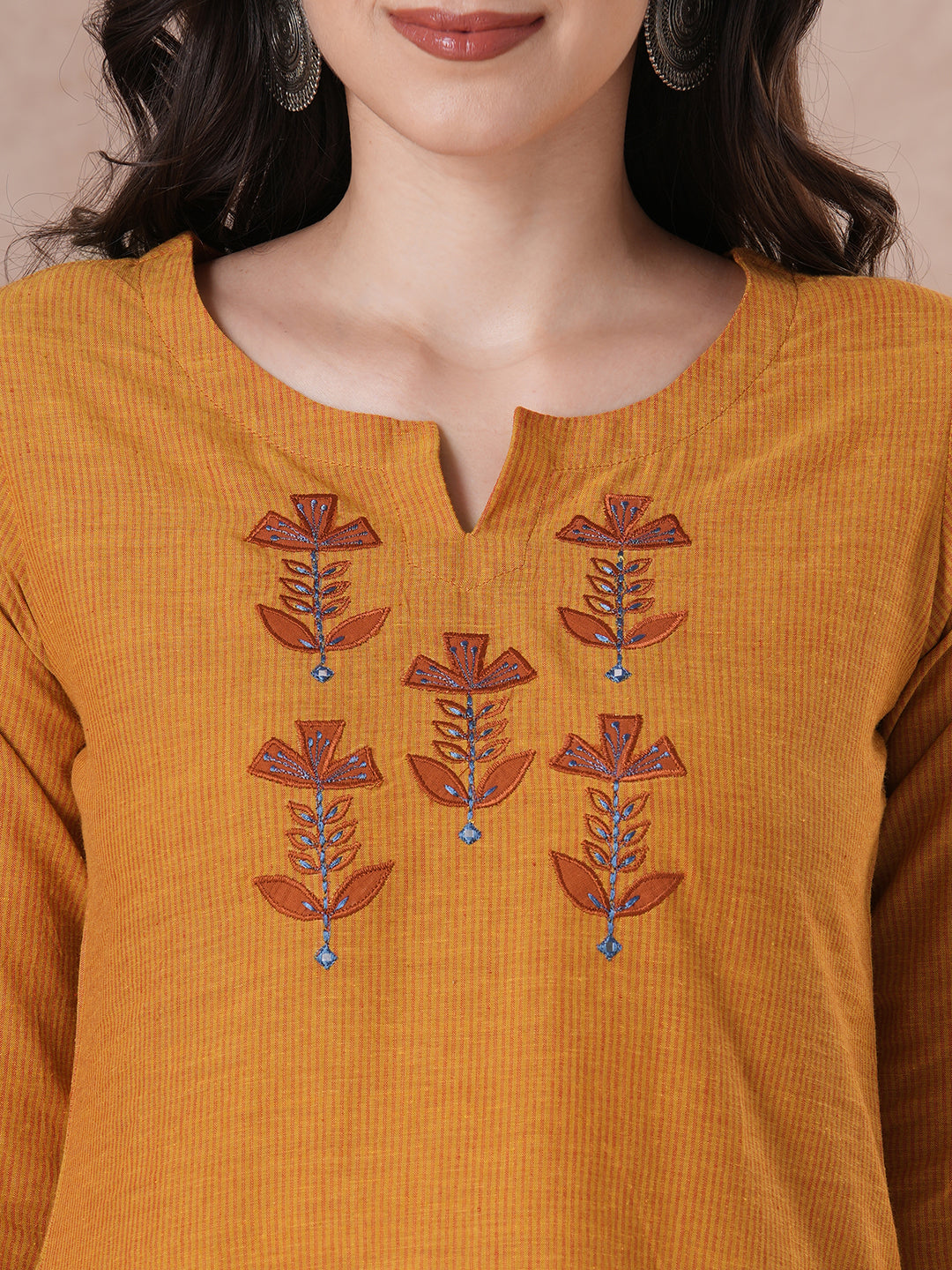 Embroidered straight fit kurta in checkered cotton fabric.