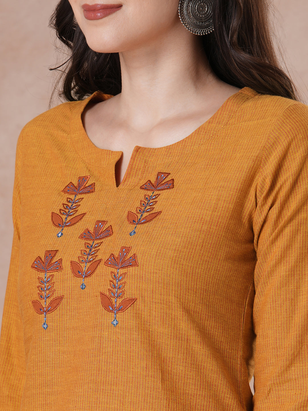 Embroidered straight fit kurta in checkered cotton fabric.