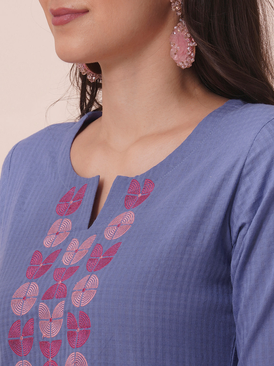 Embroidered straight fit kurta in checkered cotton fabric.