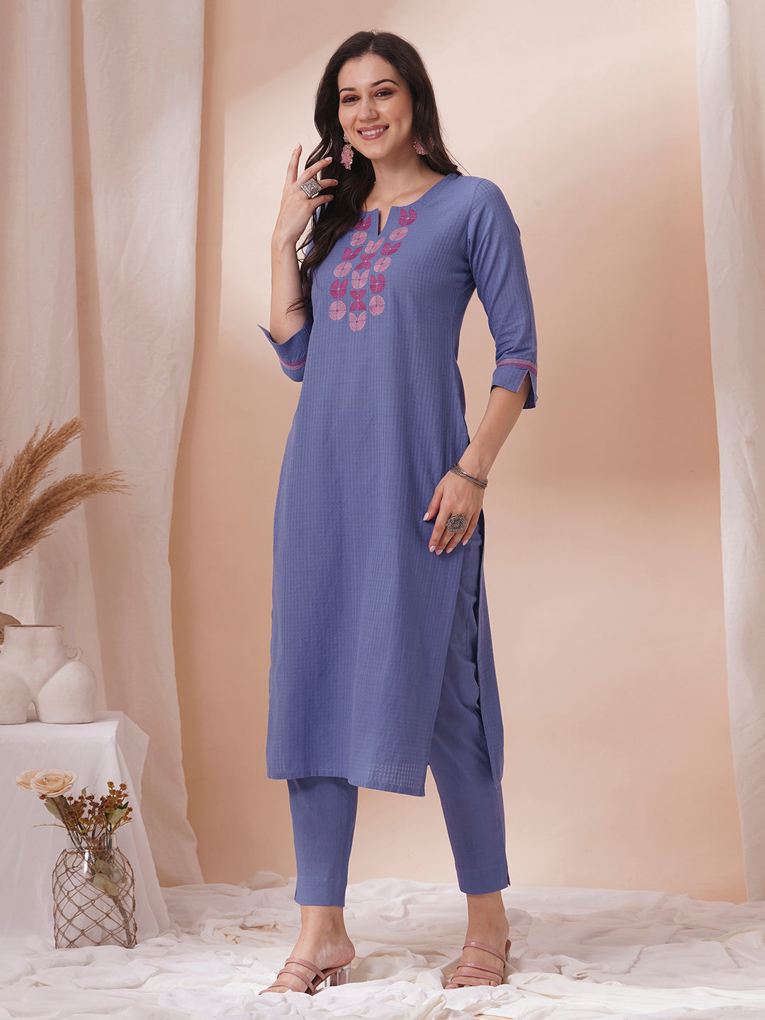 Embroidered straight fit kurta in checkered cotton fabric.