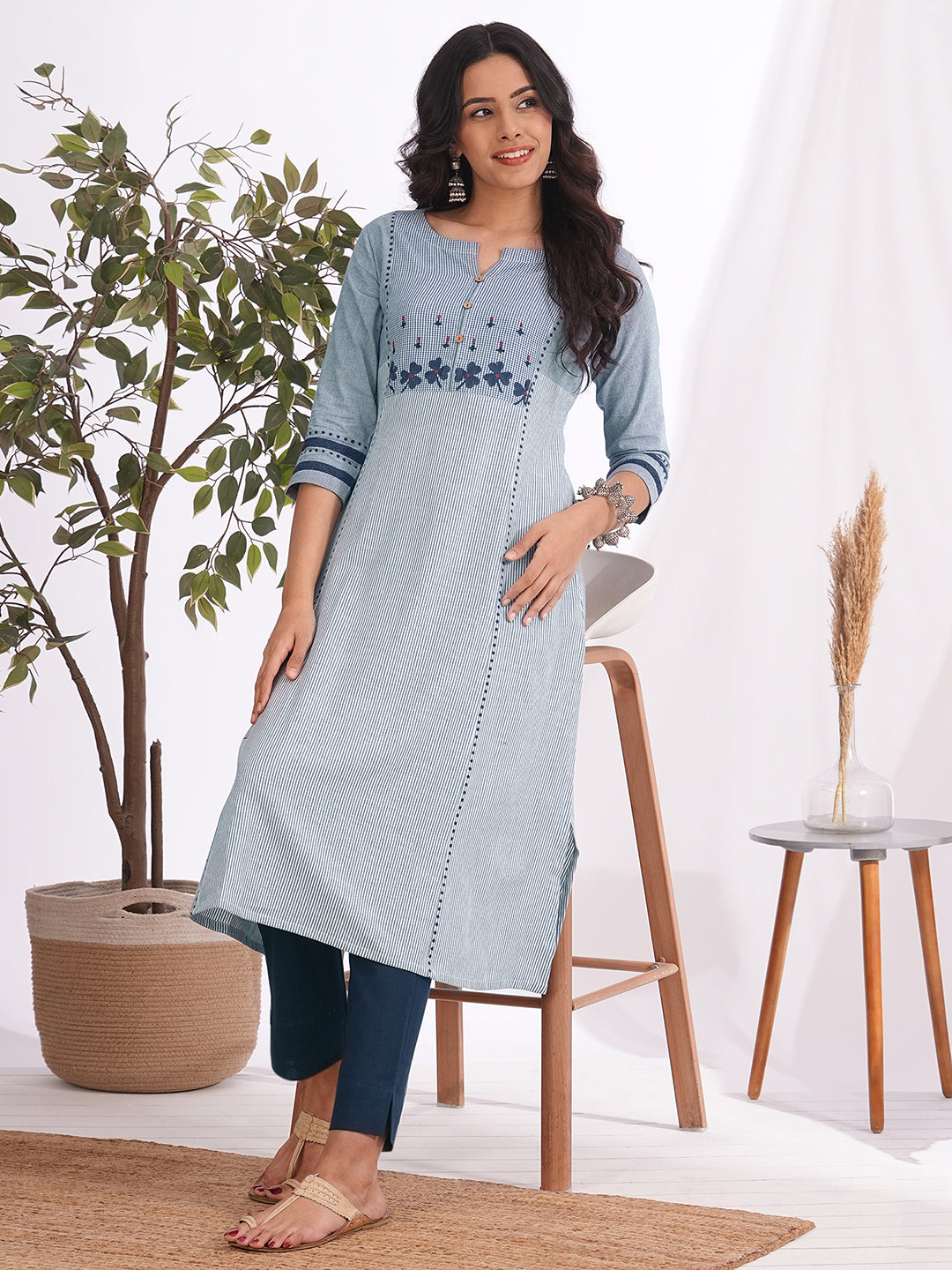 Pocketed A-line kurta in woven cotton fabric with block print and hand embroidery