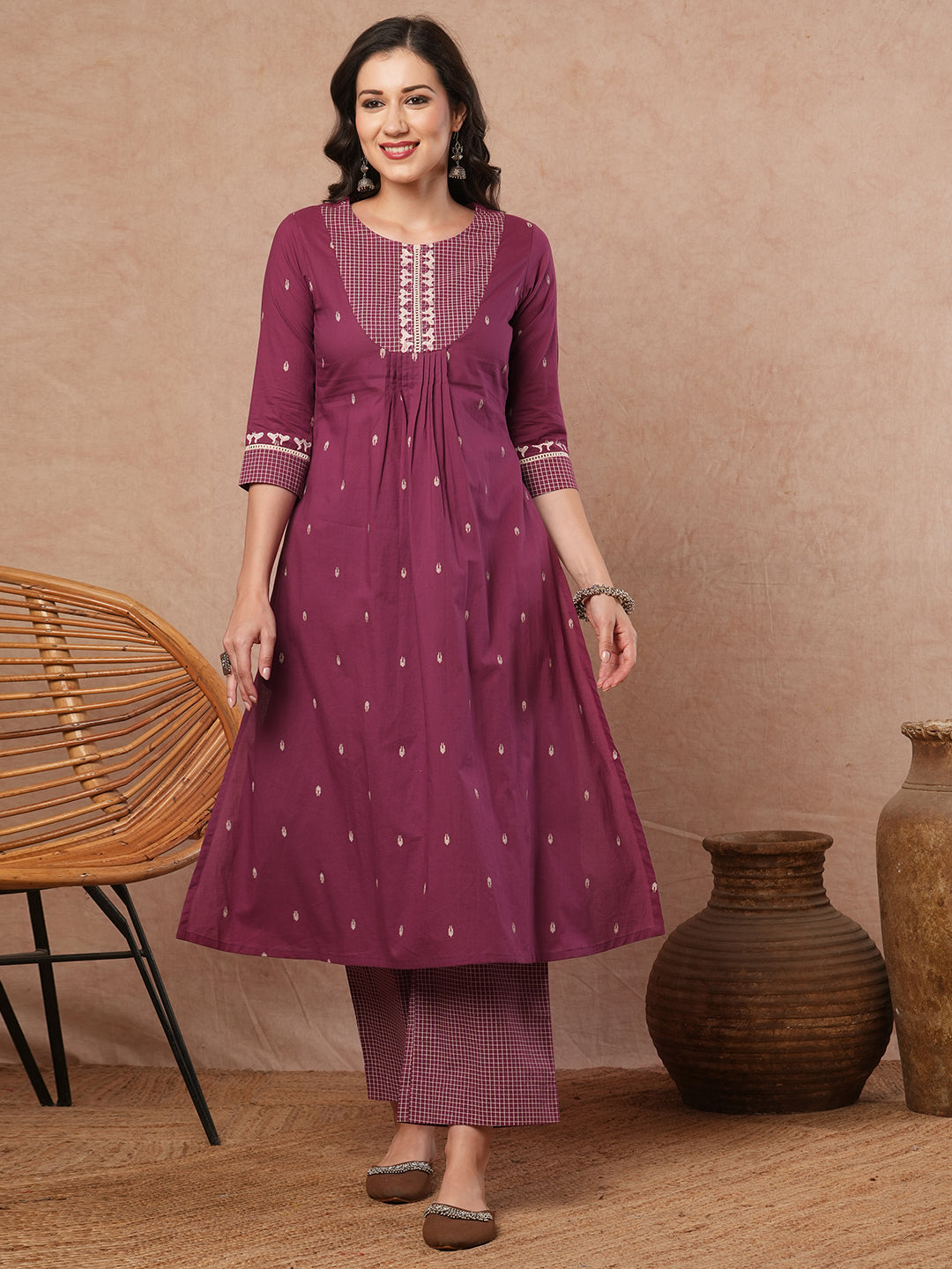 Pleated A-line printed cotton kurta with lace, block print, handwork and pocket.