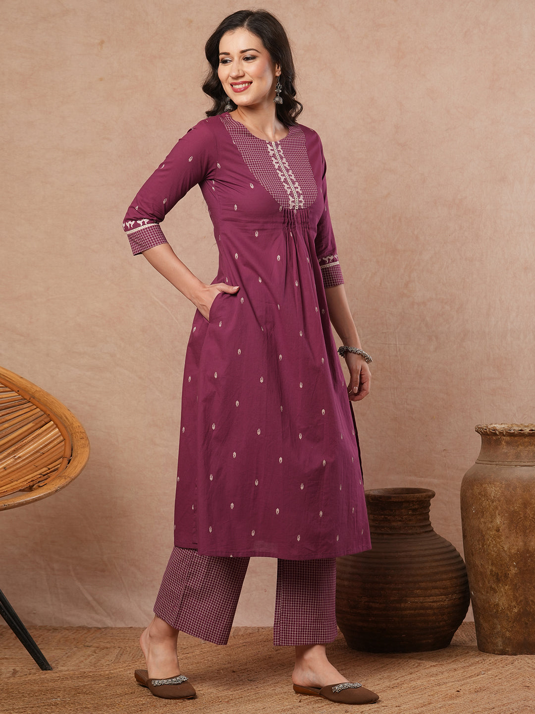 Pleated A-line printed cotton kurta with lace, block print, handwork and pocket.