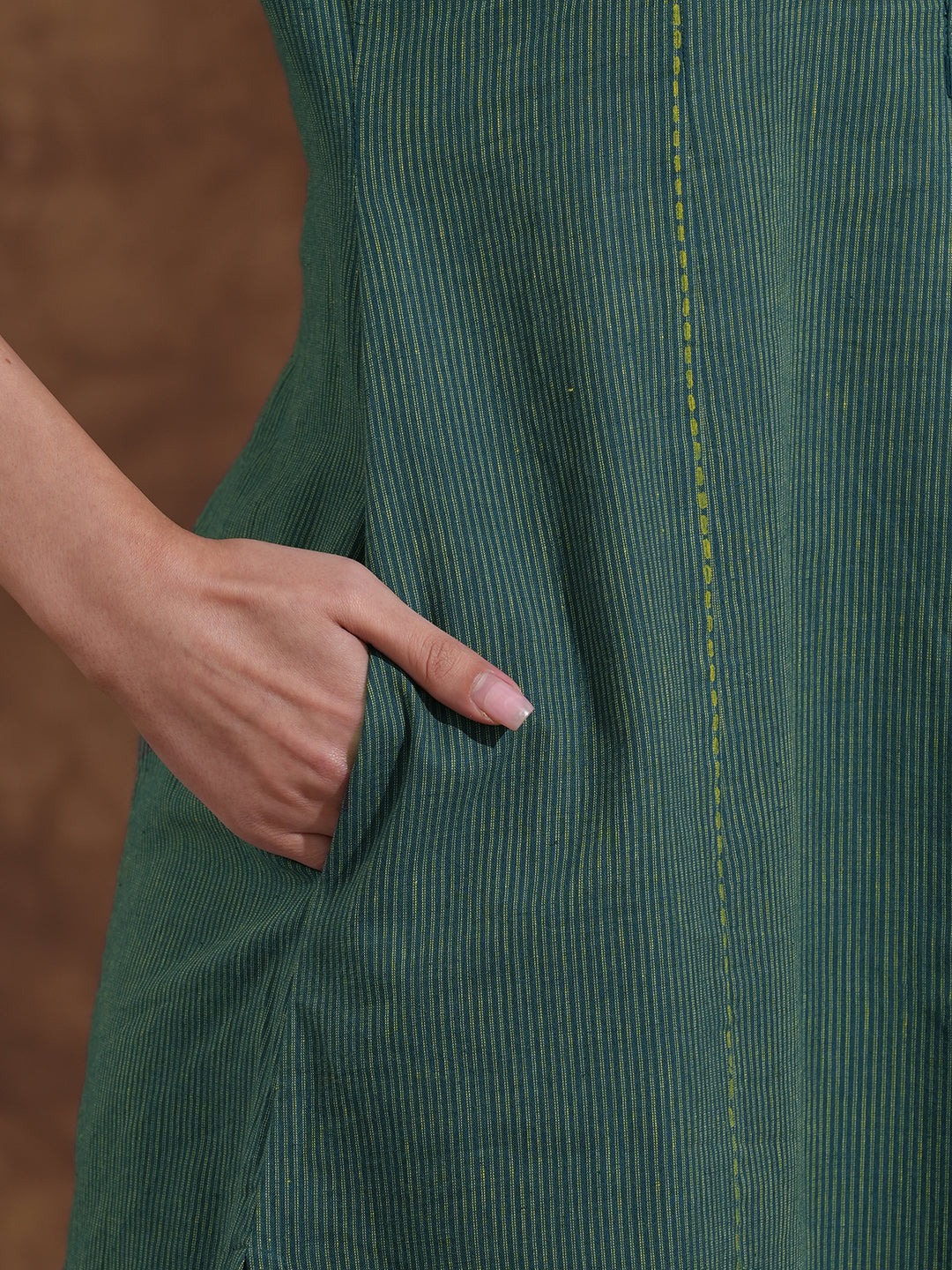 Pocketed A-line kurta in woven stripe cotton with a dobby trim and handwork detailing.