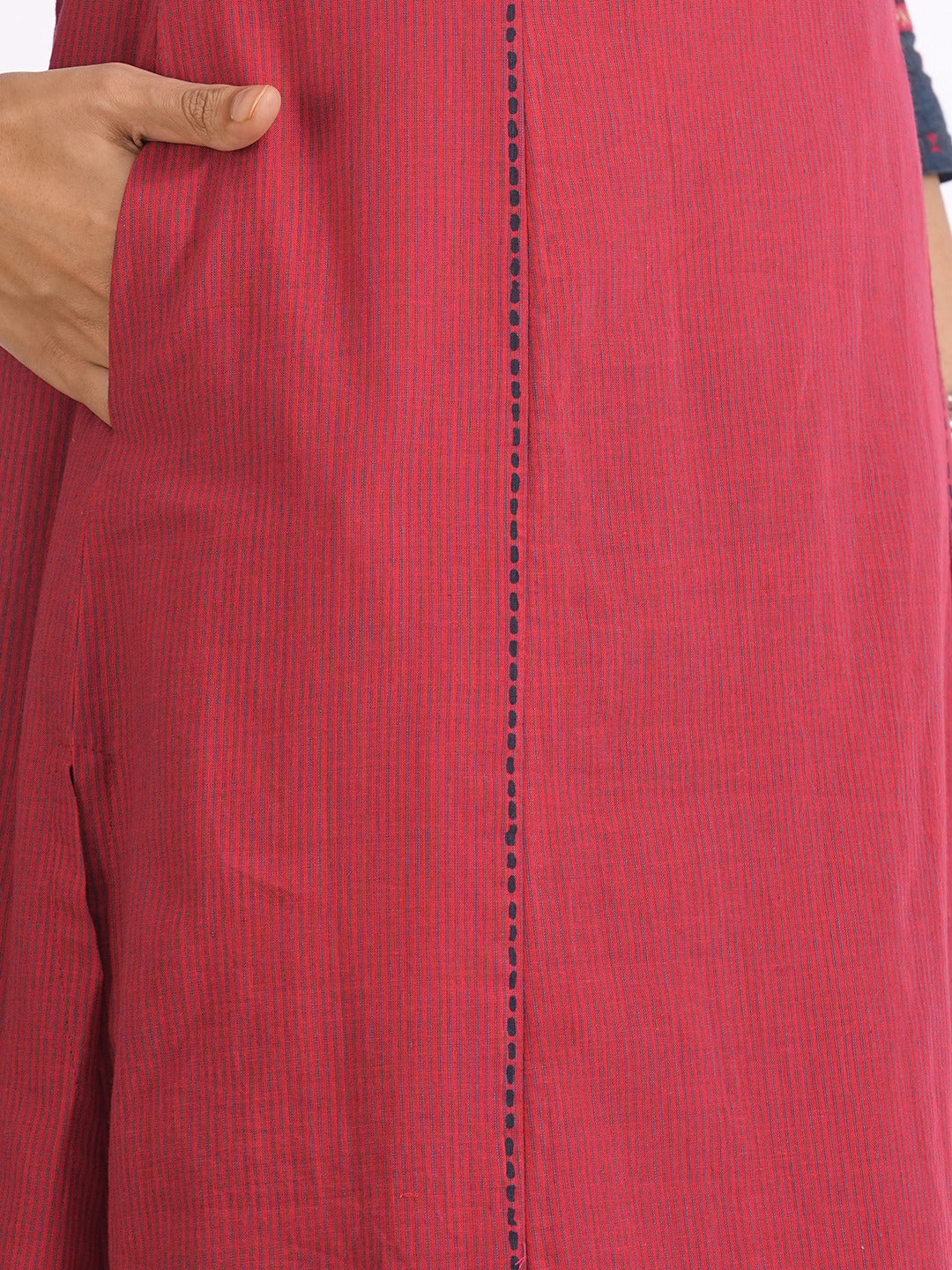 Pocketed A-line kurta in woven stripe cotton with a dobby trim, block print and handwork detailing