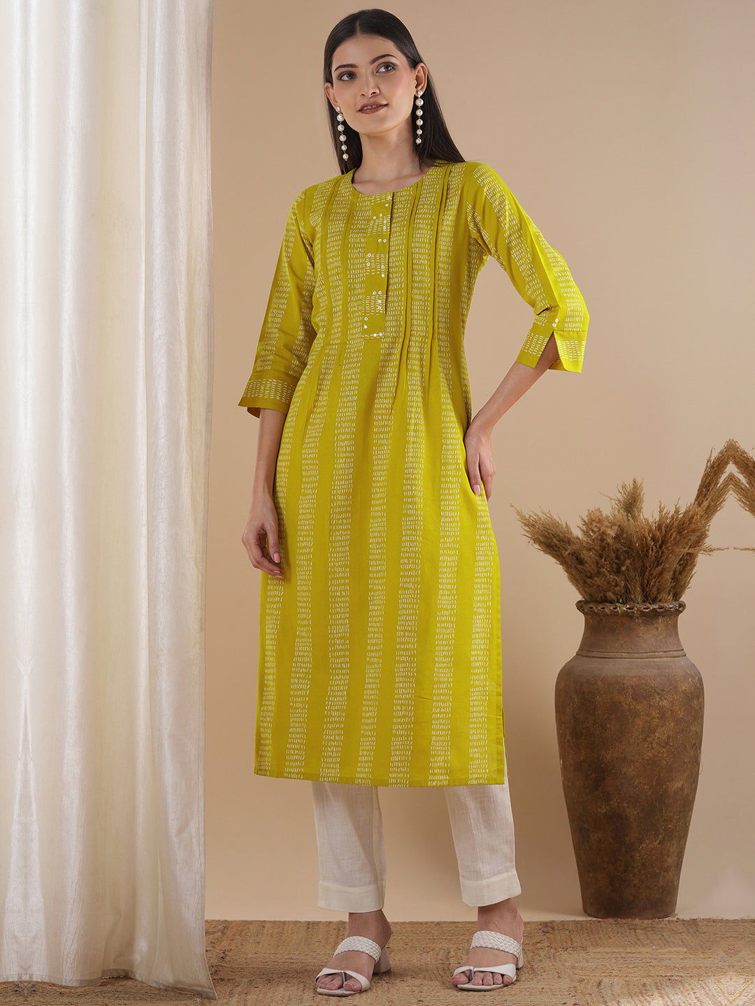 Straight fit kurta with a broad mirror work placket and tucks between stripes and broad sleeve cuff