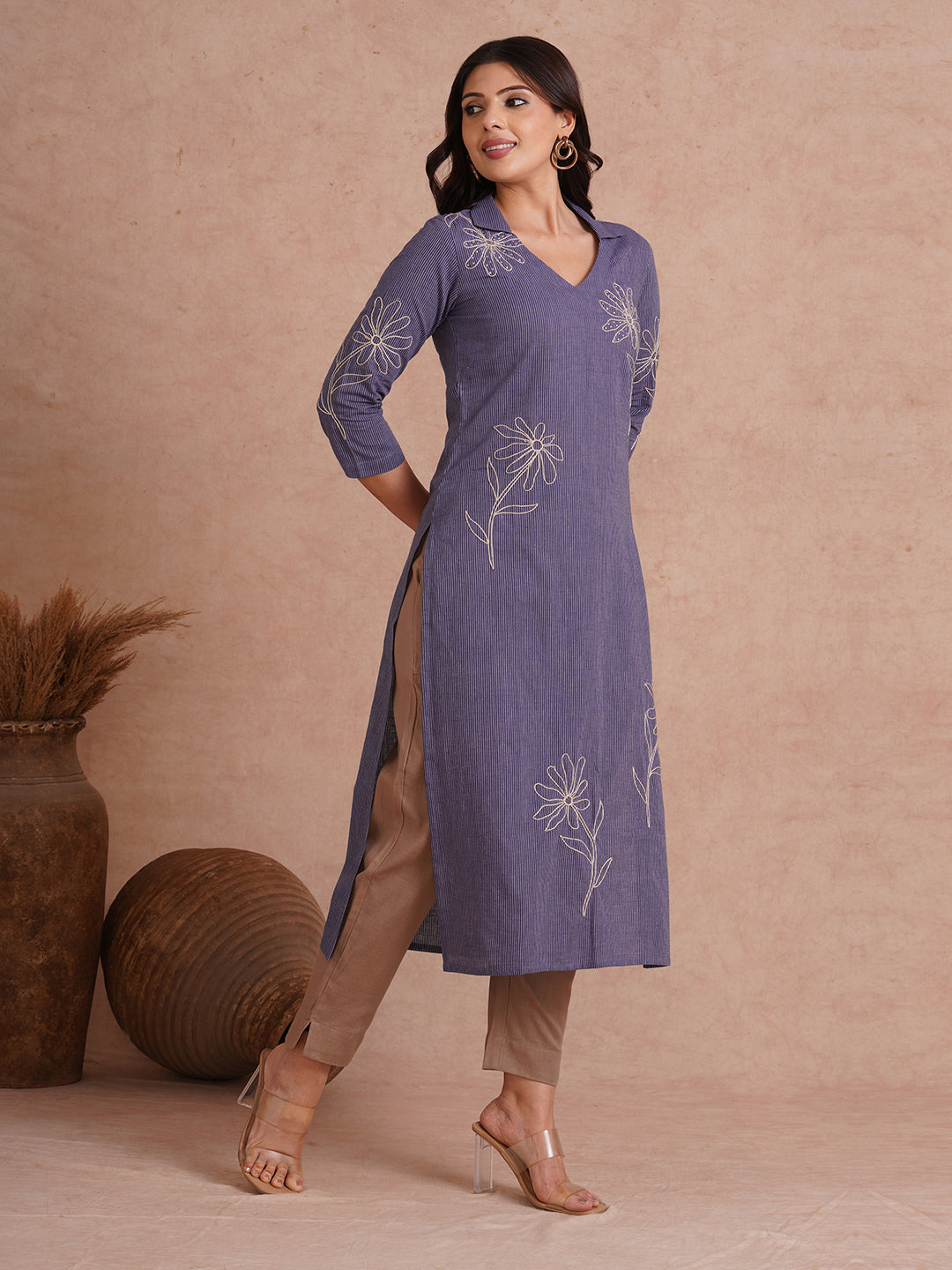 Straight fit collared kurta with placement cord work embroidery with hand sequins.
