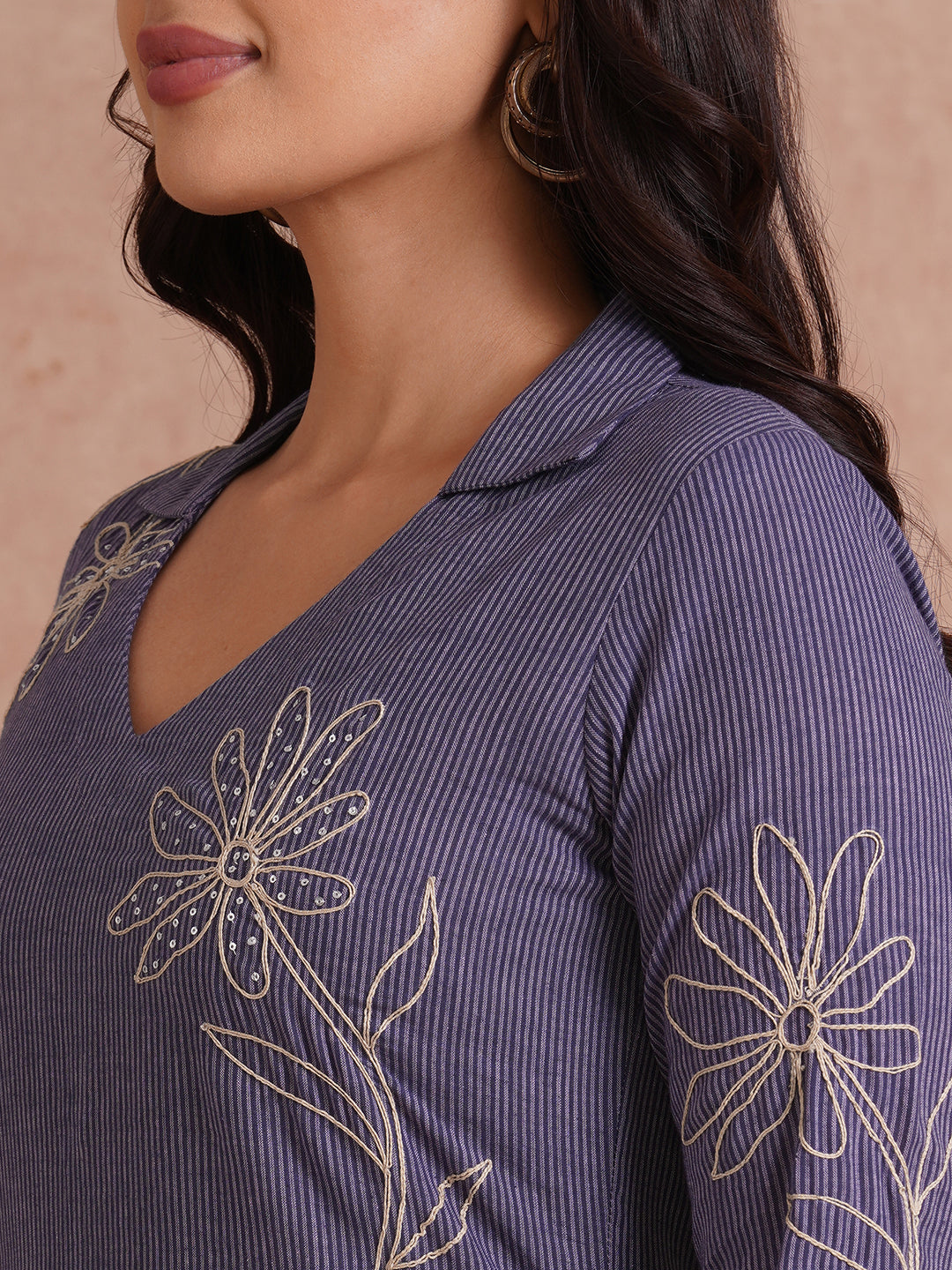 Straight fit collared kurta with placement cord work embroidery with hand sequins.