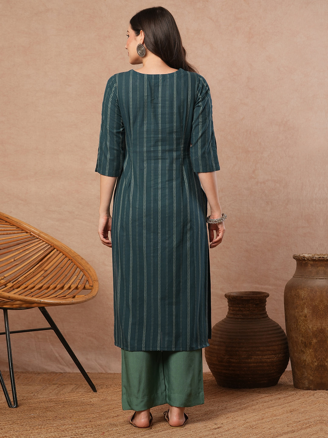 A dobby stripe straight fit kurta with stripe manipulation on the overlapping yoke.