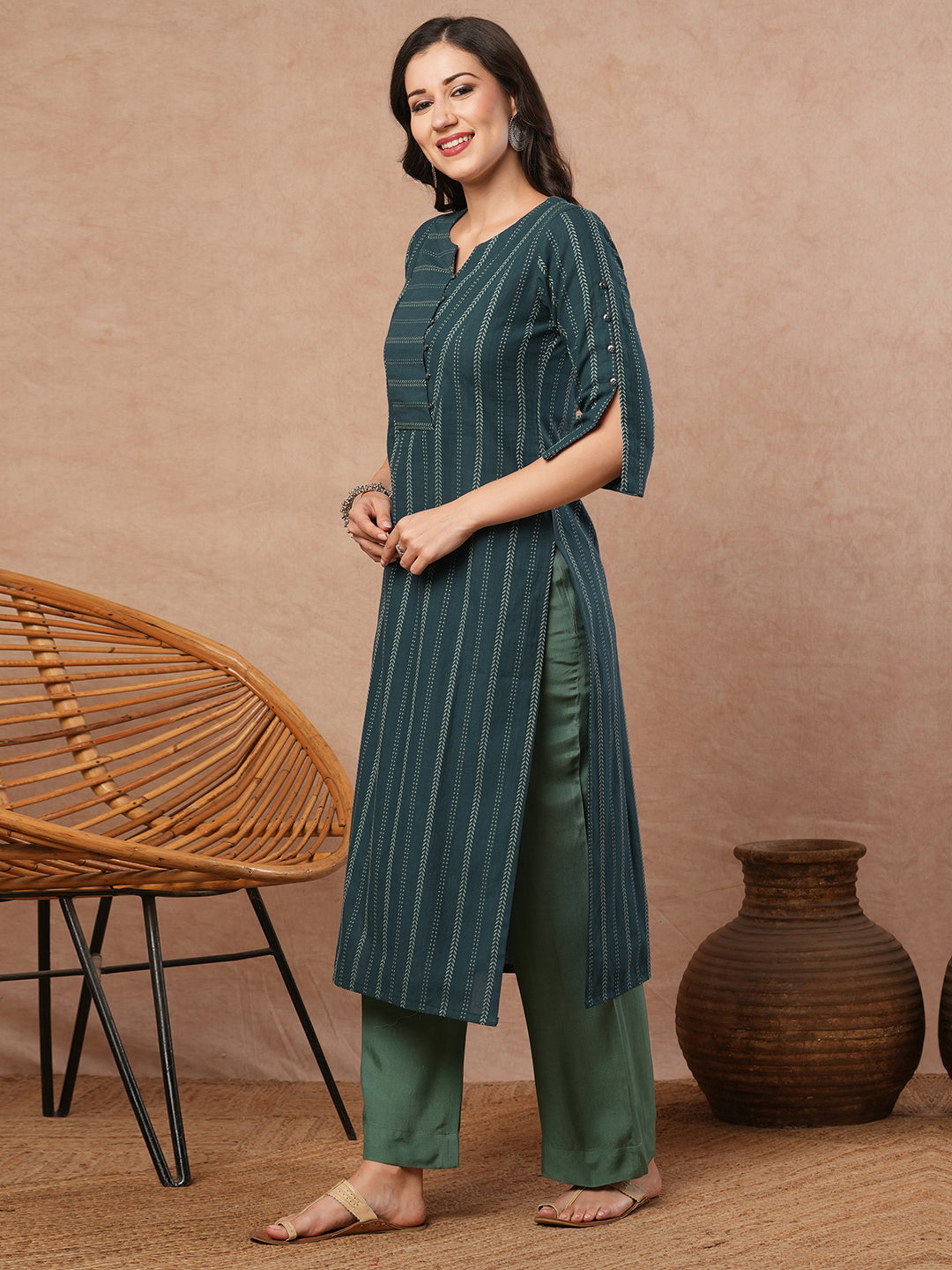 A dobby stripe straight fit kurta with stripe manipulation on the overlapping yoke.