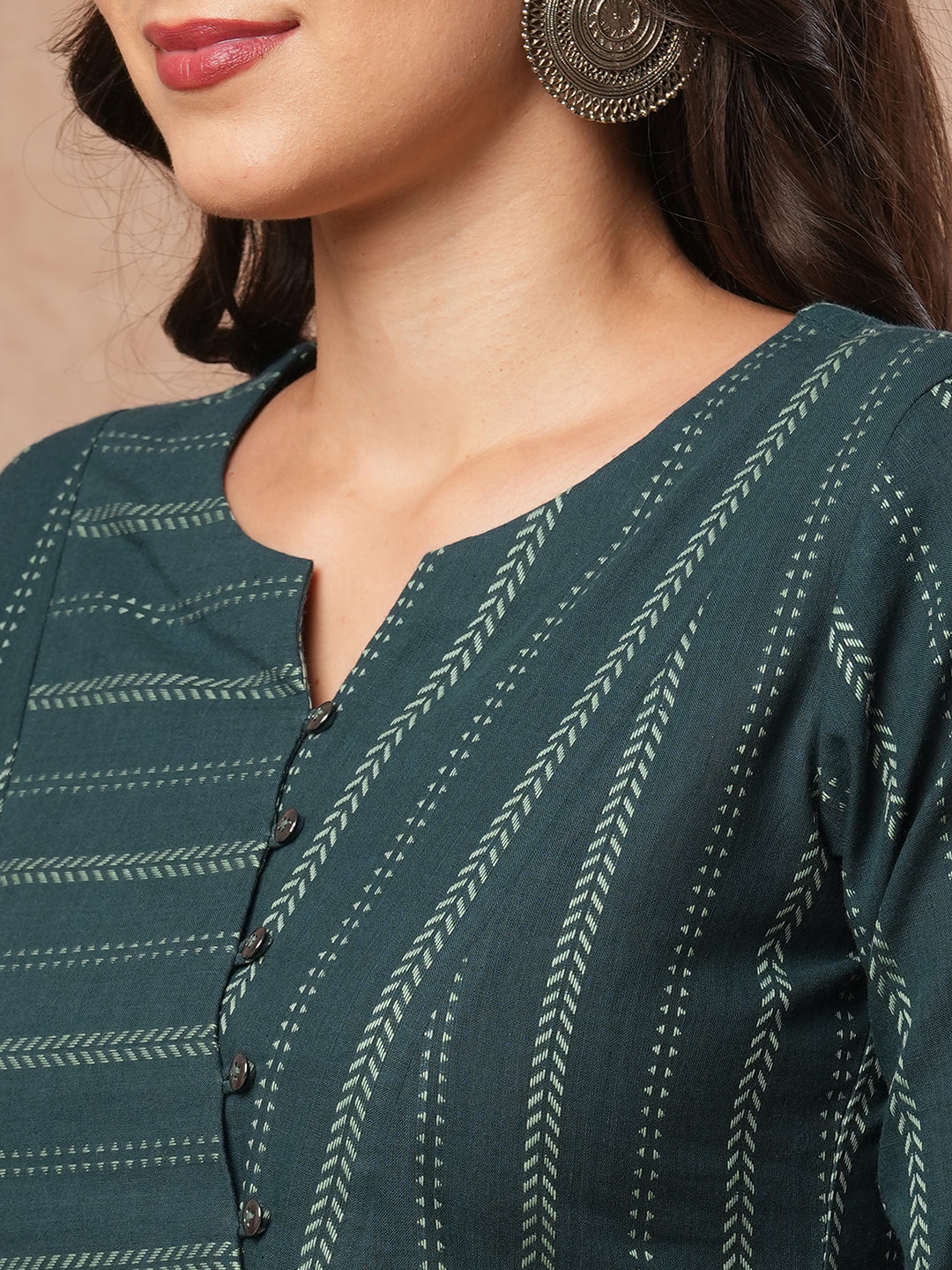 A dobby stripe straight fit kurta with stripe manipulation on the overlapping yoke.