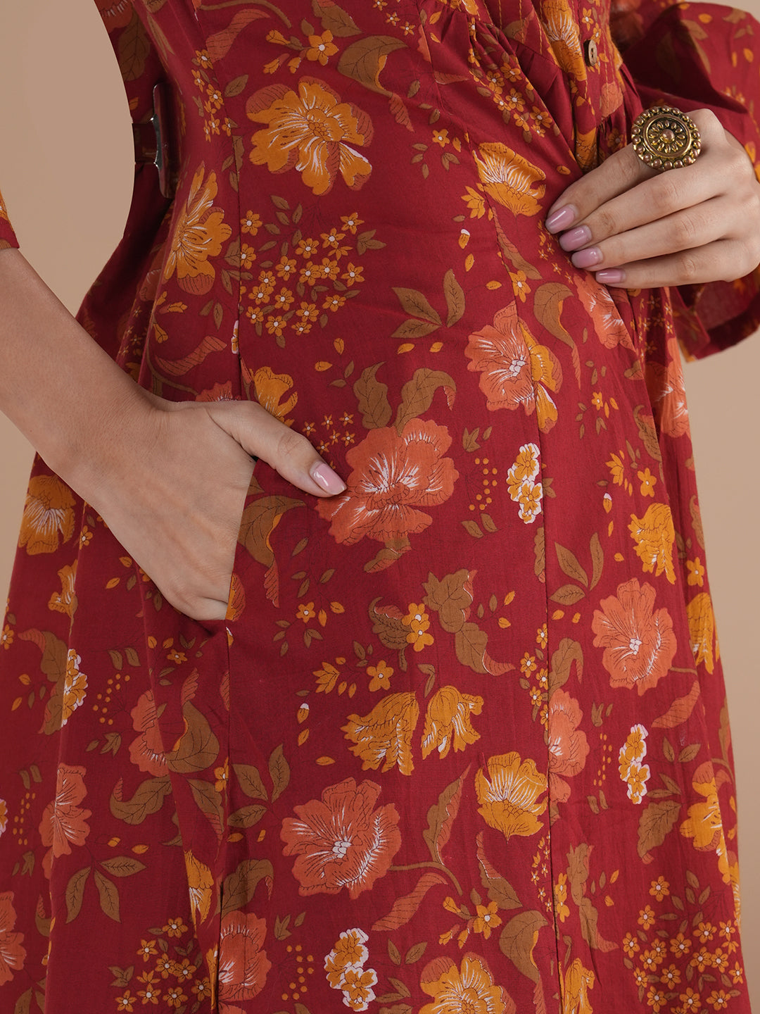 A printed shoulder princess A-line kurta with stitch lines on the shaped yoke and bell sleeves