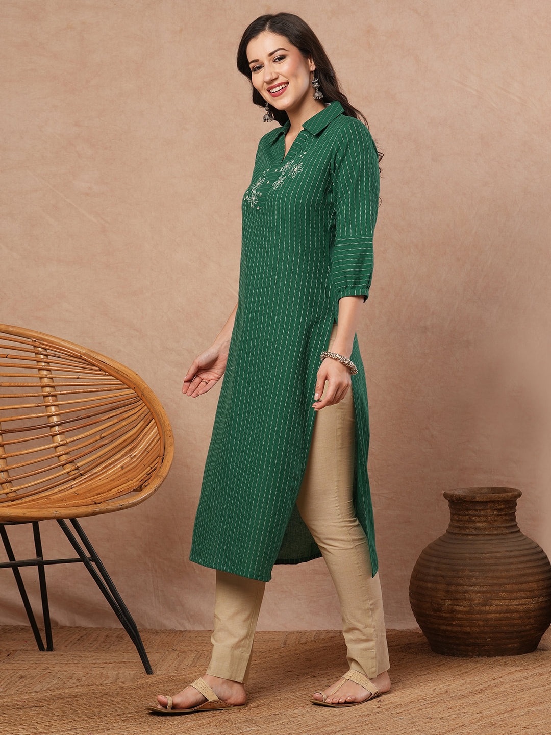 Straight fit kurta with collar and gathered sleeves with handwork on kantha stripe fabric.