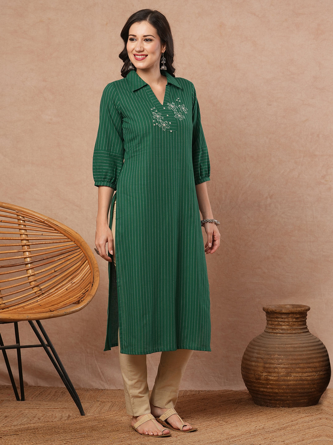 Straight fit kurta with collar and gathered sleeves with handwork on kantha stripe fabric.
