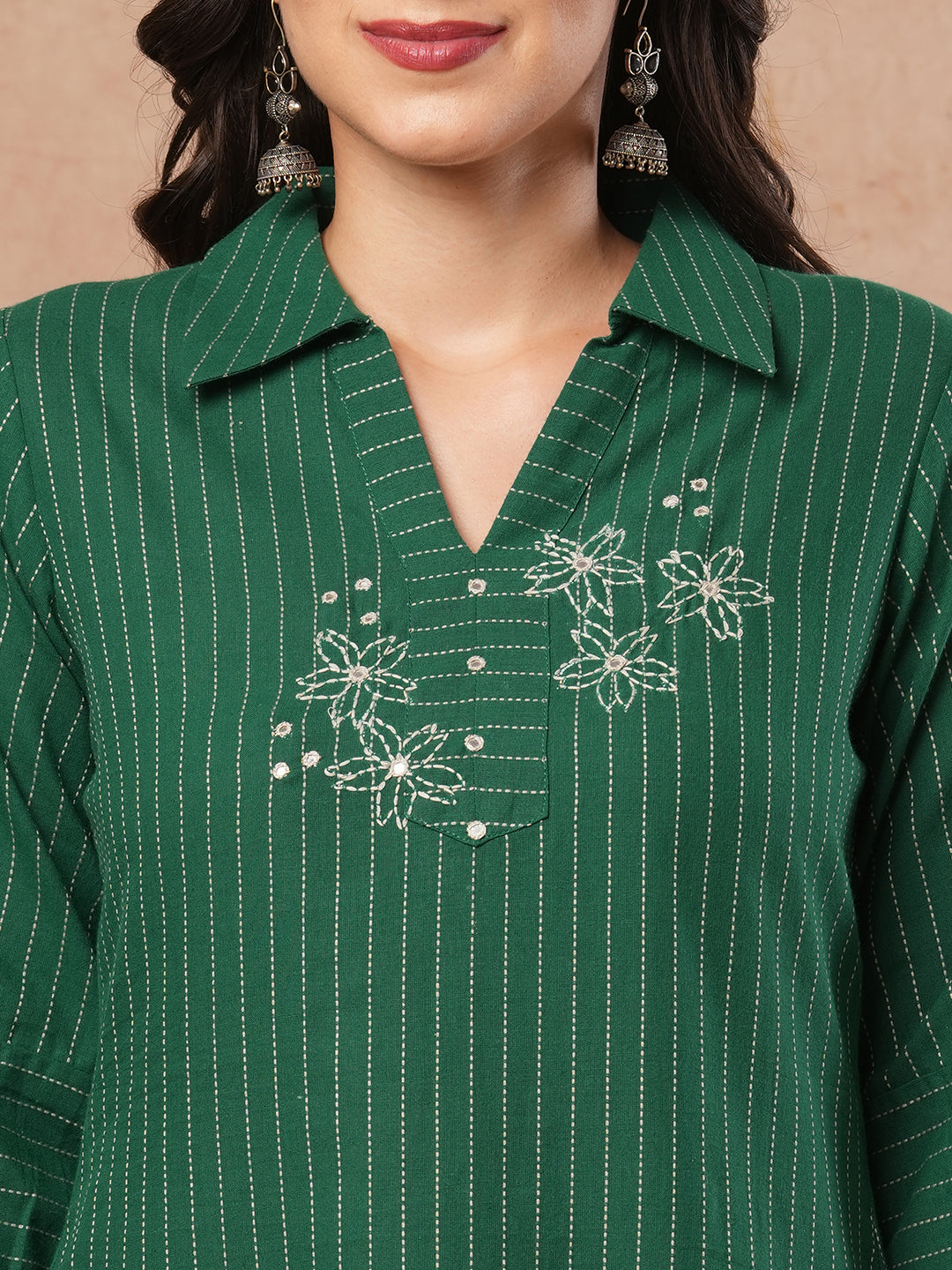 Straight fit kurta with collar and gathered sleeves with handwork on kantha stripe fabric.