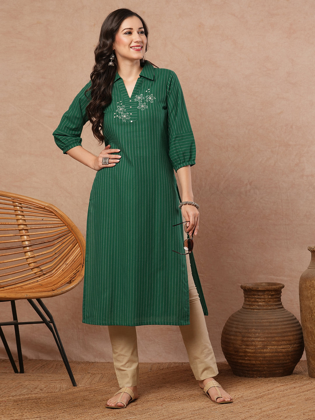 Straight fit kurta with collar and gathered sleeves with handwork on kantha stripe fabric.