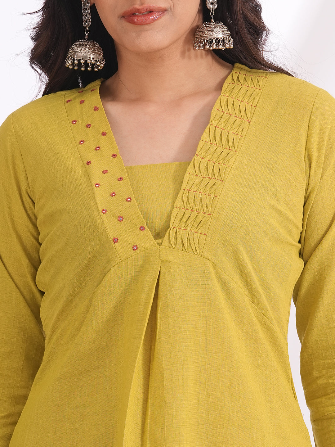 Straight fit kurta with smocking and mirrorwork neckline, shaped waistline with centre box pleat