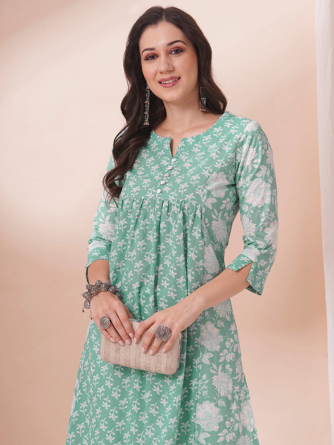 An armhole princess A-line kurta with contrast print centre panels with under bust gathers in the front.