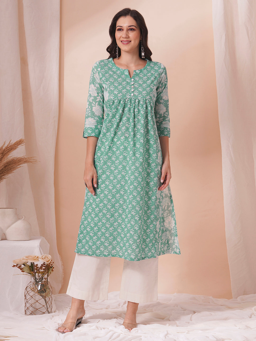 An armhole princess A-line kurta with contrast print centre panels with under bust gathers in the front.