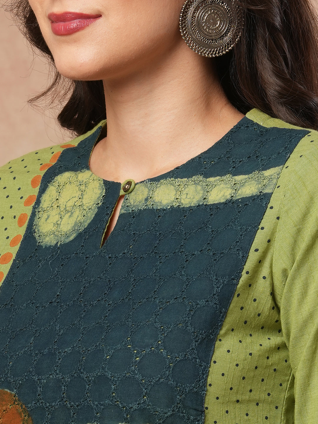 Straight fit kurta with borar fabric asymmetrical yoke and block print.