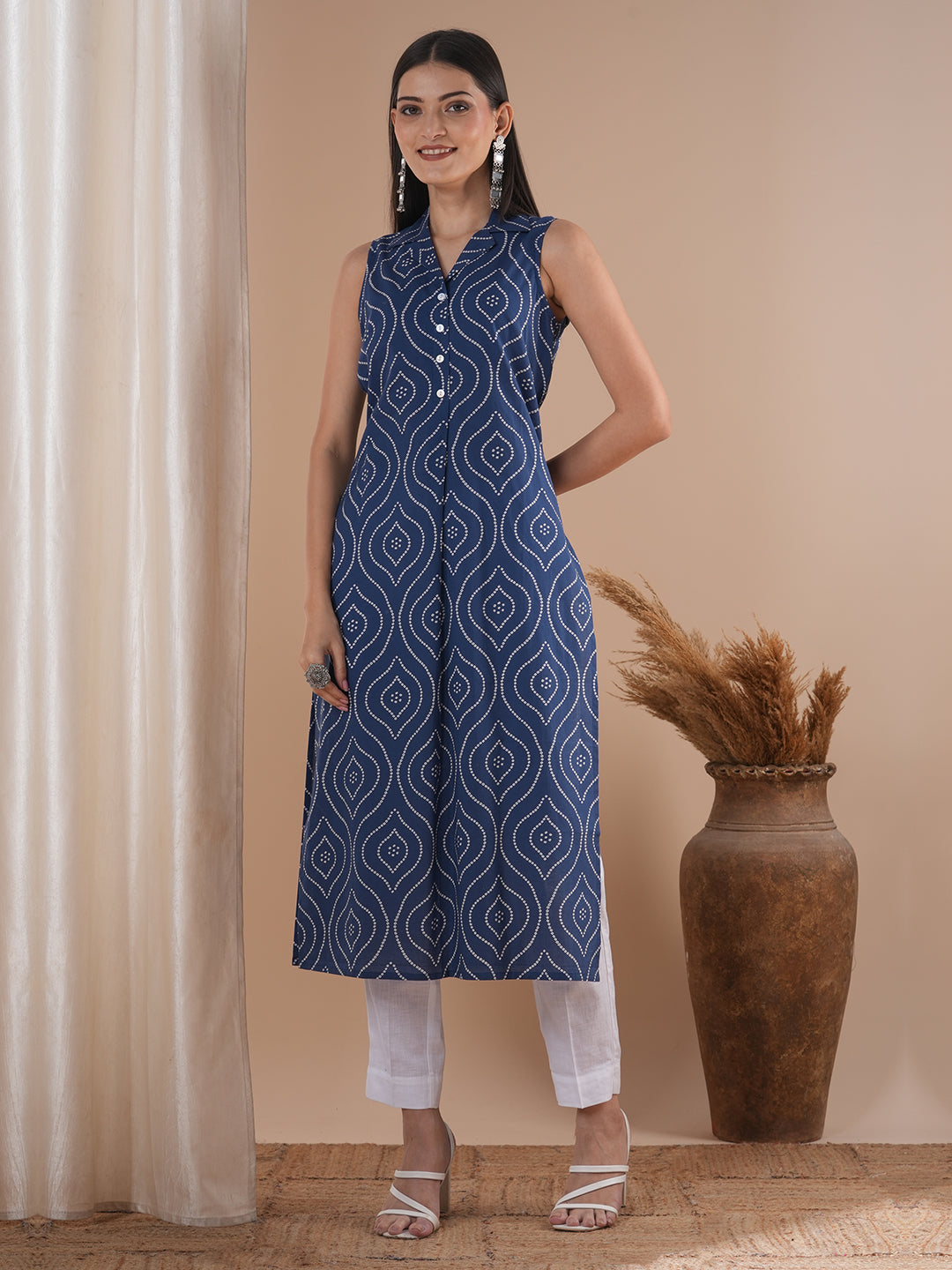 Straight sleeveless notch collared kurta with centre pleat and placket