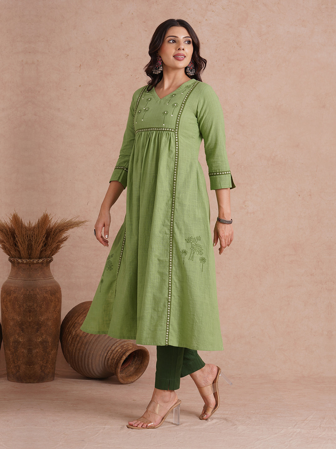 A-line kurta with contrast borders on seams and sleeves with block printed yoke.