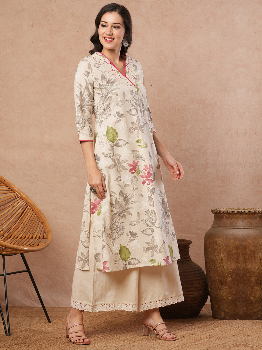 A-line printed kurta with embroidery and box pleated sleeves with contrast piping detailing.