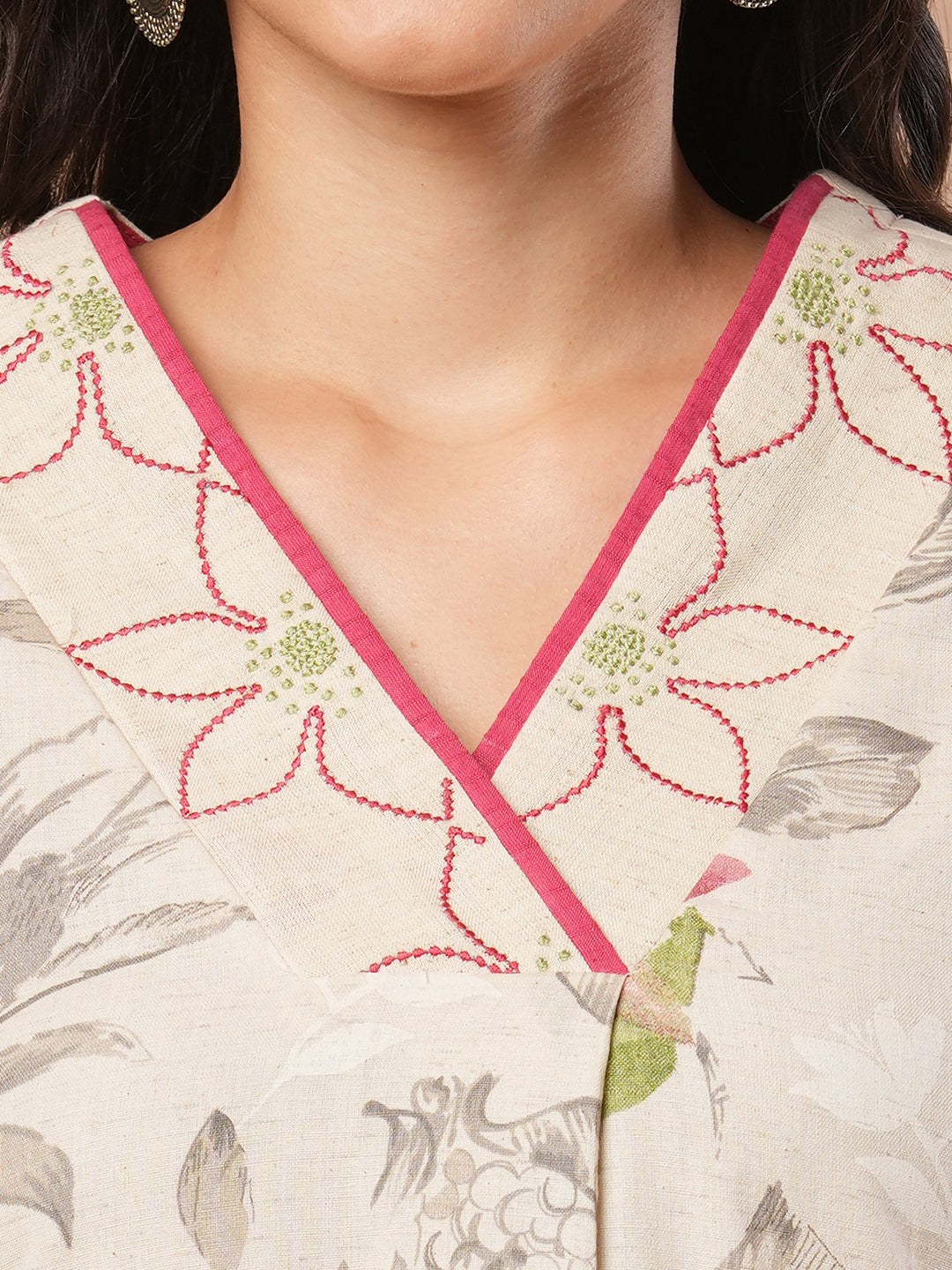 A-line printed kurta with embroidery and box pleated sleeves with contrast piping detailing.