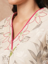 A-line printed kurta with embroidery and box pleated sleeves with contrast piping detailing.