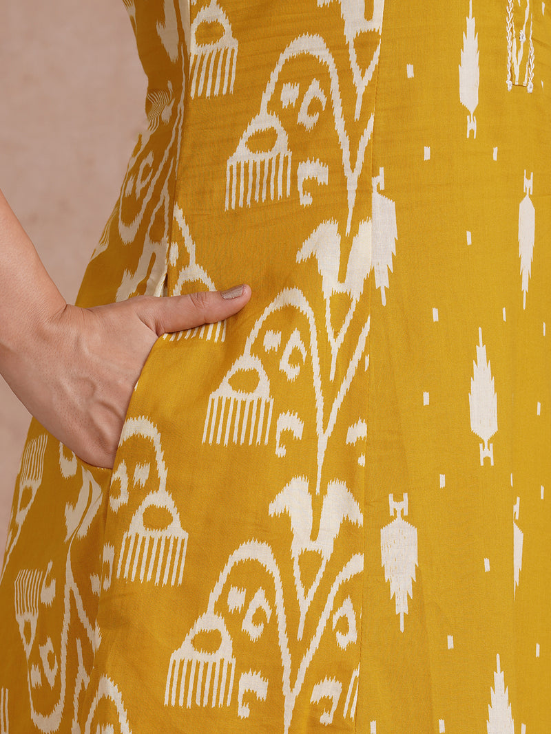 A-Line shoulder princess kurta with coordinating prints and handwork around placket.