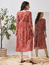 Printed flared kurta with layered waist gathers and trim detailing with handwork mirrors.