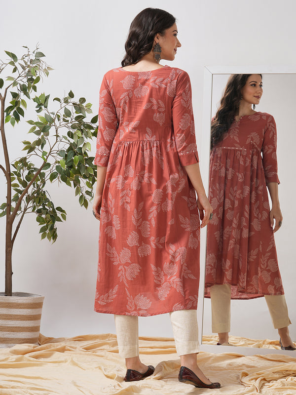 Printed flared kurta with layered waist gathers and trim detailing with handwork mirrors.