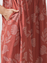 Printed flared kurta with layered waist gathers and trim detailing with handwork mirrors.