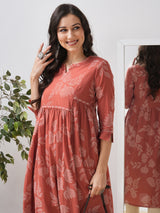 Printed flared kurta with layered waist gathers and trim detailing with handwork mirrors.