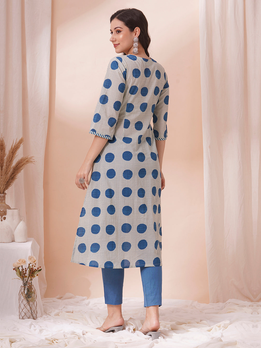 A-line print mix-match kurta with button detailing and bell sleeves.