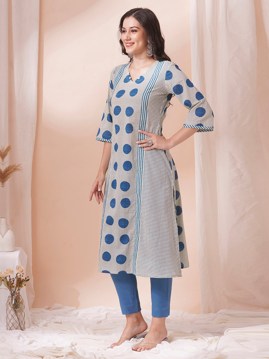 A-line print mix-match kurta with button detailing and bell sleeves.